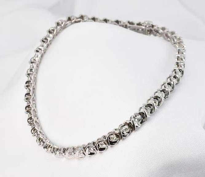 Stylish 2 Ct. TW Diamond Tennis Bracelet in 10K WG