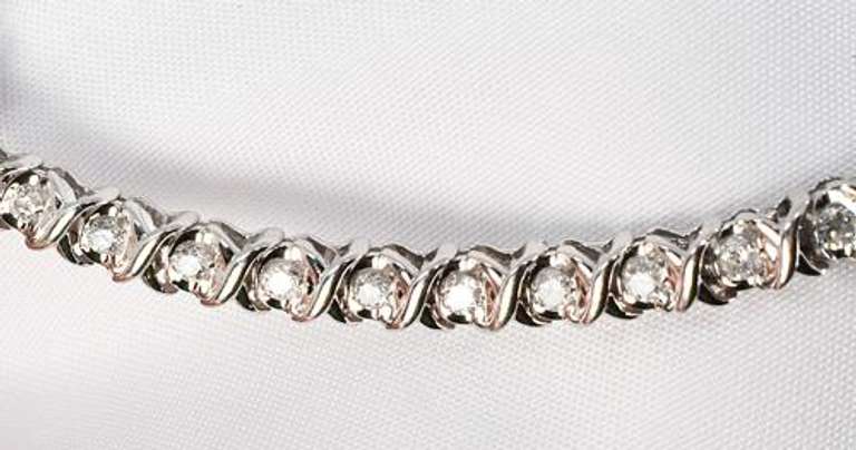 Stylish 2 Ct. TW Diamond Tennis Bracelet in 10K WG