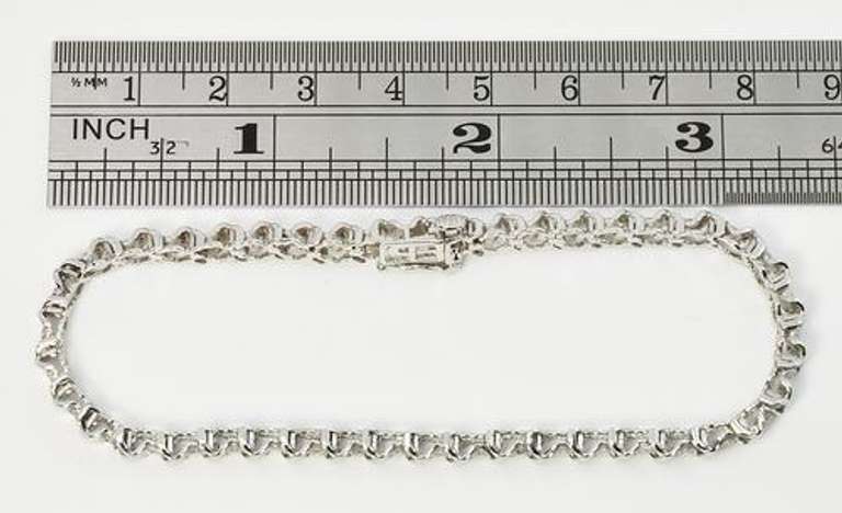 Stylish 2 Ct. TW Diamond Tennis Bracelet in 10K WG