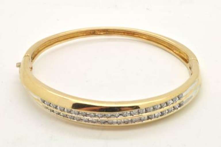 LADIES 14K  GOLD AND DIAMOND  BANGLE