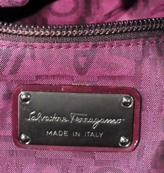 Salvatore Ferregamo burgandy leather purse