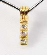 Tasteful Three Diamond Pendant in 14K