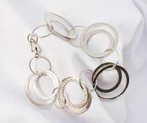 A Trio of Fun Bracelets in .925 Silver