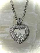 Diamond-Laden 18K Floating Diamonds Heart Pendant