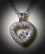 Diamond-Laden 18K Floating Diamonds Heart Pendant
