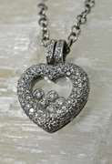 Diamond-Laden 18K Floating Diamonds Heart Pendant