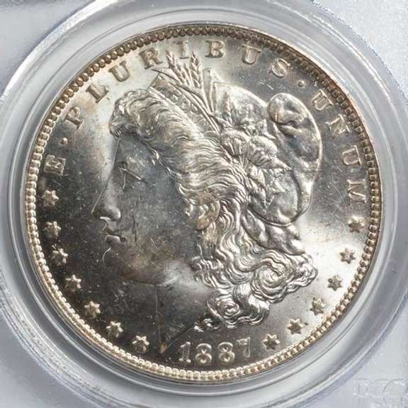 1887 O PCGS MS 63 Morgan In A Rattler Holder
