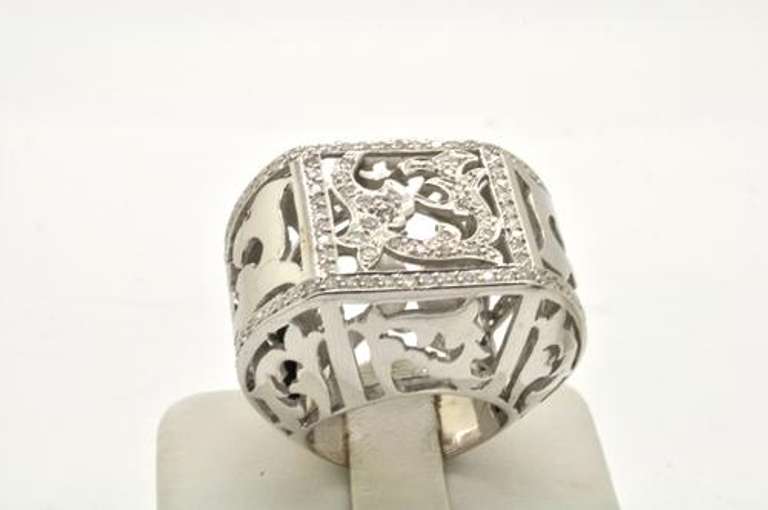 UNIQUE 18 KT WHITE GOLD DIAMOND RING