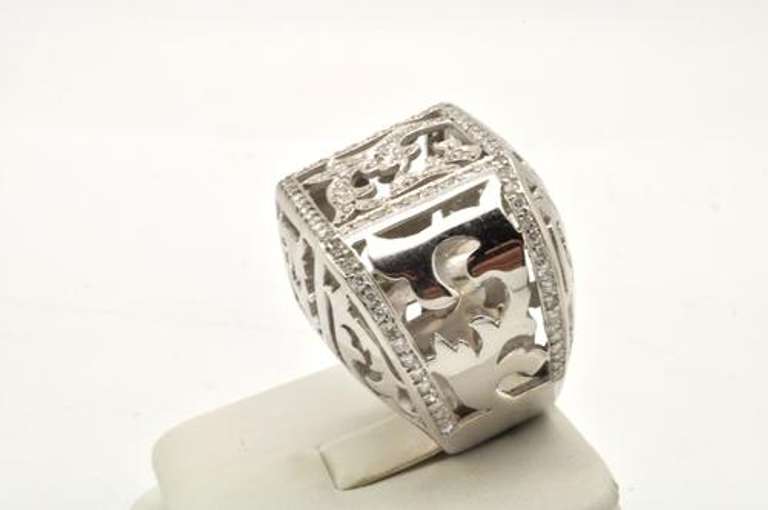 UNIQUE 18 KT WHITE GOLD DIAMOND RING