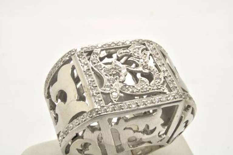 UNIQUE 18 KT WHITE GOLD DIAMOND RING