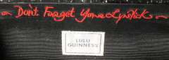 Lulu Gunnes black purse " don't forget lipstick "