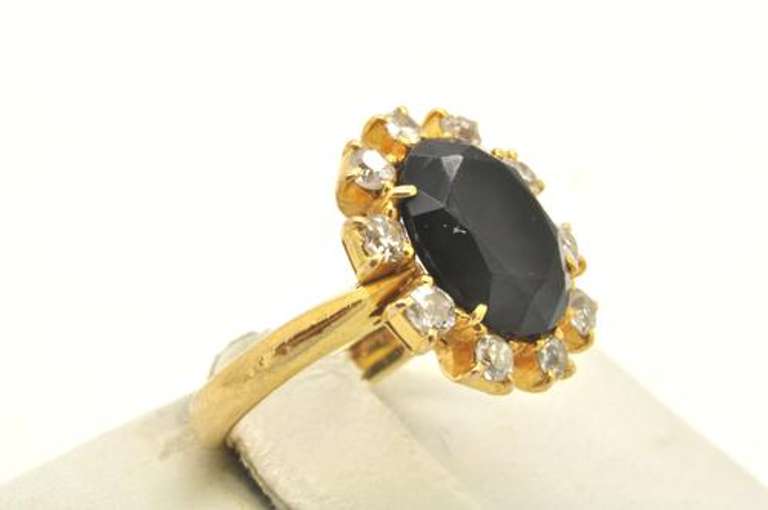 LADIES 18 KT SAPPHIRE AND DIAMOND RING