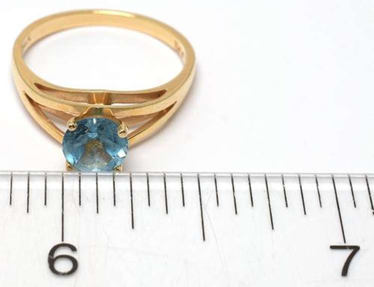 Blue Topaz Solitaire Ring in 14KT