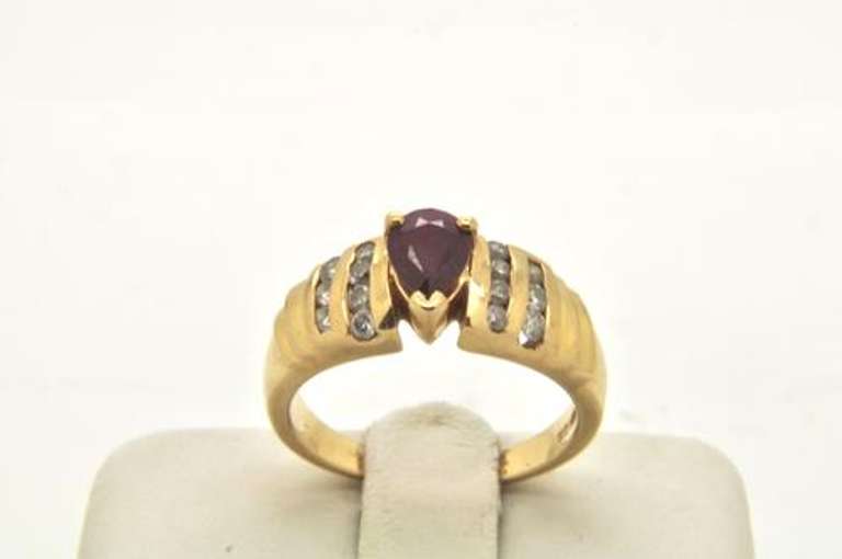 LADIES 14 KT GOLD RUBY AND DIAMOND RING
