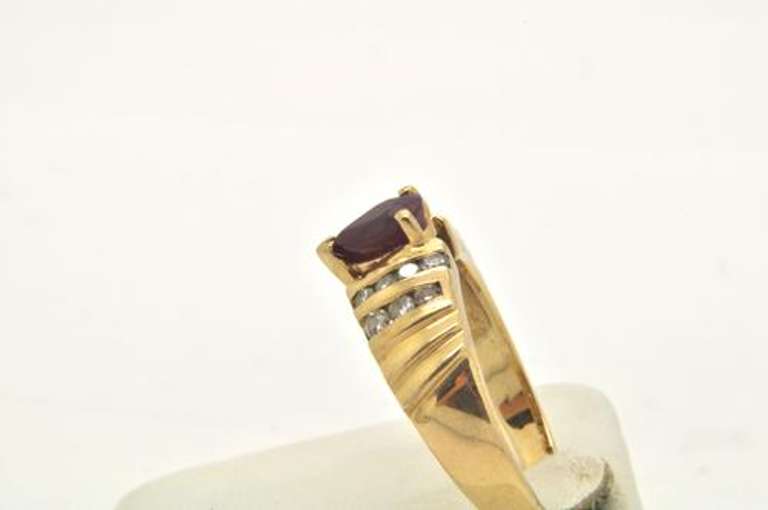 LADIES 14 KT GOLD RUBY AND DIAMOND RING