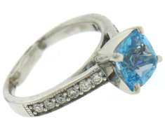Shocking Blue Topaz and Diamond Milgrain Ring