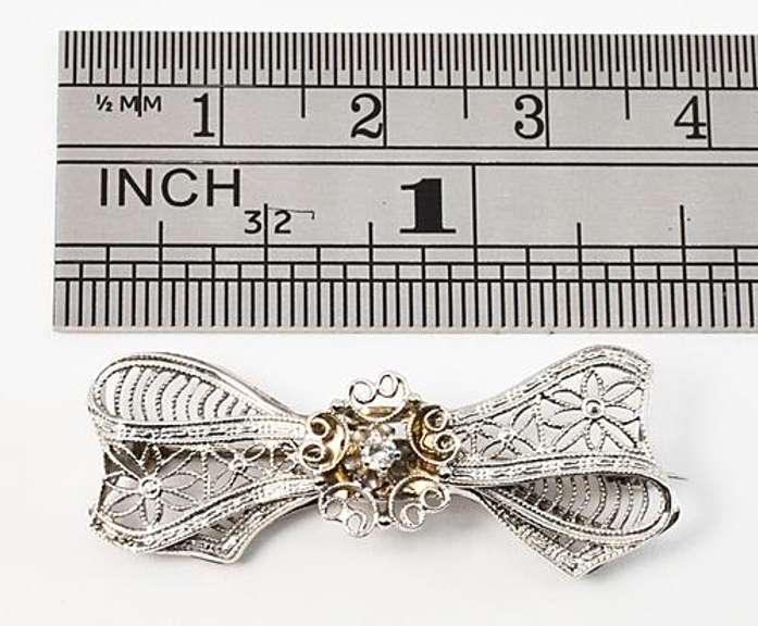 Sweet White Gold Filigree Bow Brooch