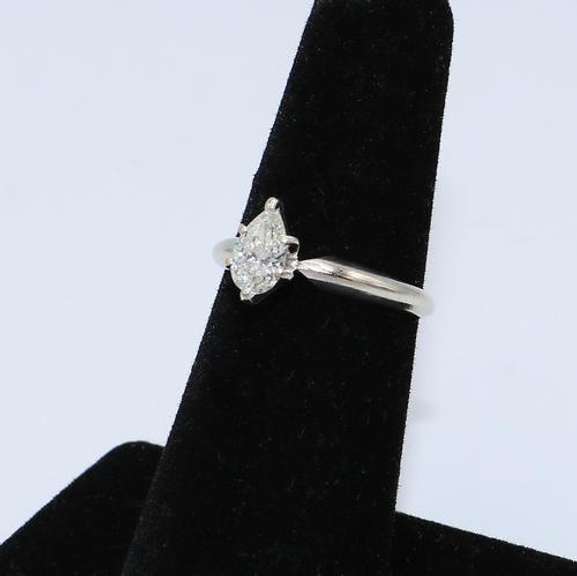 Delicate Pear Shaped Diamond Solitaire Ring