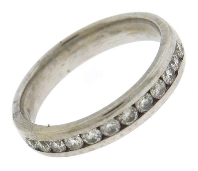 Modern & Sleek 14kt WG Channel Set Diamond Band