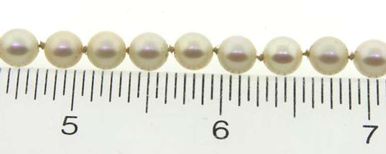 Fancy 14kt YG  6.5-7mm Pearl Necklace with Detailed Ruby Clasp