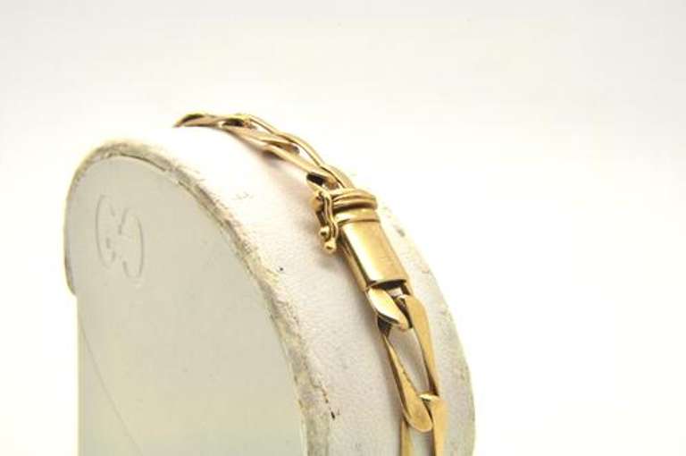 14 KT SOLID GOLD ITALIAN FIGARO BRACELET