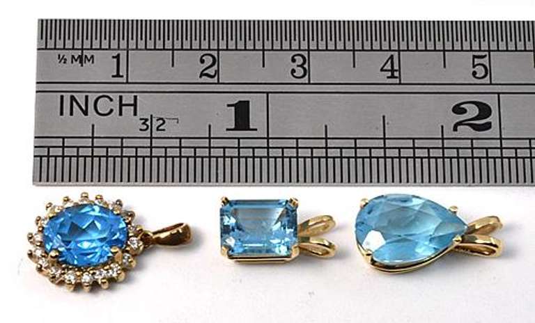 Tasteful Trio of Blue Topaz Pendants in 14K YG