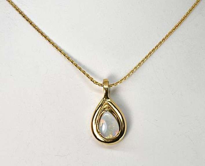 Tasteful Opal Pendant Necklace in 14K Yellow Gold