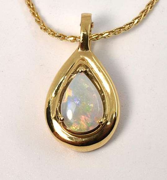 Tasteful Opal Pendant Necklace in 14K Yellow Gold