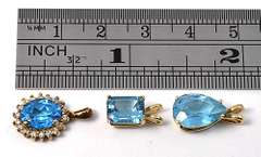 Tasteful Trio of Blue Topaz Pendants in 14K YG