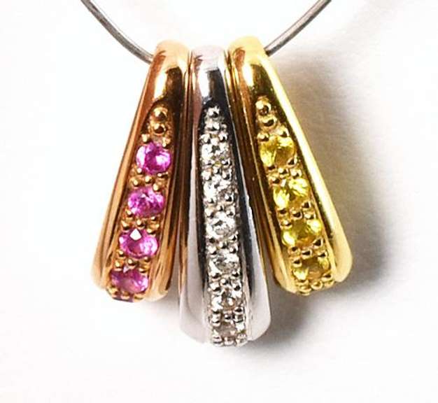 Useful Group of 18k Slider Pendants