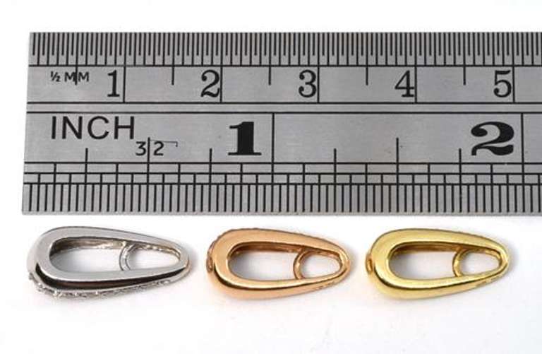 Useful Group of 18k Slider Pendants