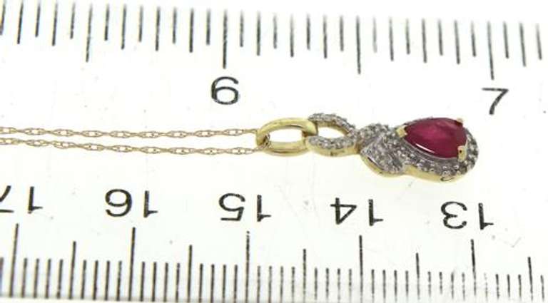 Gorgeous 10kt YG Ruby with Diamond Halo Necklace