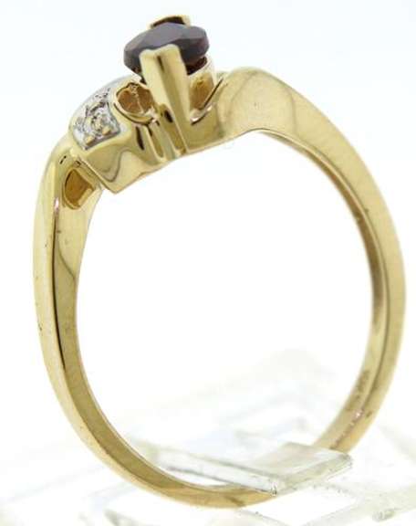 Beautiful Yellow Gold Marquise Cut Garnet and Diamond Bypass Ring
