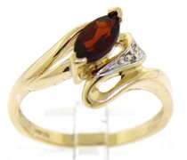 Beautiful Yellow Gold Marquise Cut Garnet and Diamond Bypass Ring