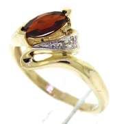 Beautiful Yellow Gold Marquise Cut Garnet and Diamond Bypass Ring