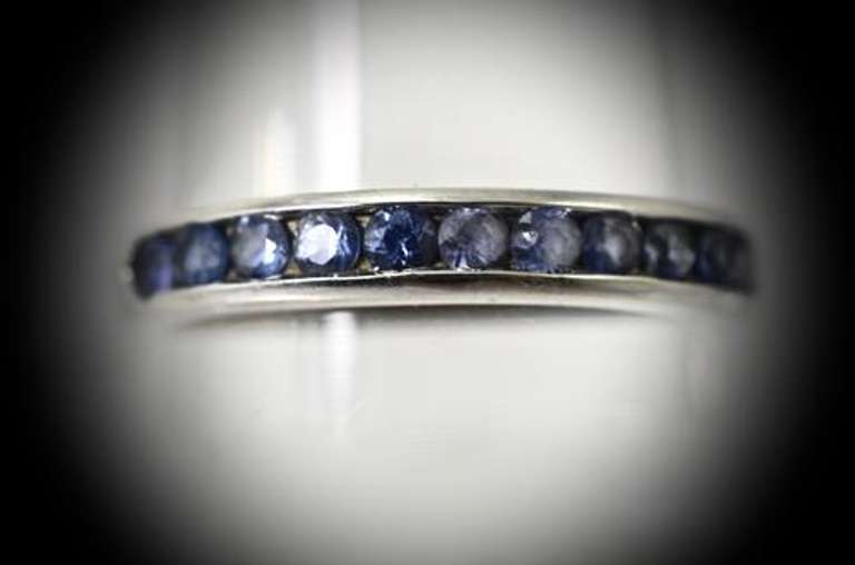 Desirable 18K White Gold Channel Set Sapphire Band