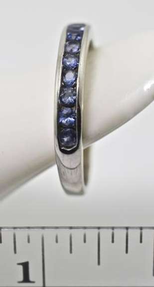 Desirable 18K White Gold Channel Set Sapphire Band