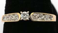 Sweet Diamond Engagement Ring in Yellow Gold