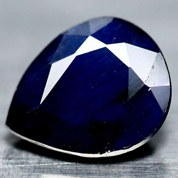 Bold 4.09ct blue black pear cut Sapphire