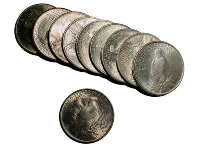 10 BU Assorted Frosty White Peace Dollars