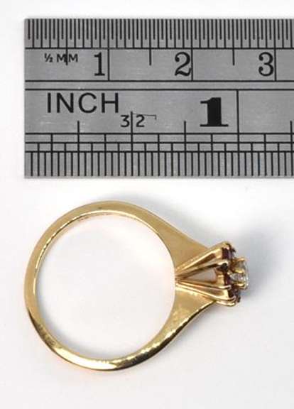 Feminine Diamond Amidst Rubies Ring