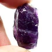 Collectors rich untreated 24.50ct uncut Amethyst