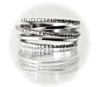 Intriguing 18K and Diamond 5-Part Ring