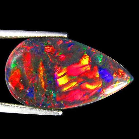 Silky black 9.42ct rainbow flashing Black Opal