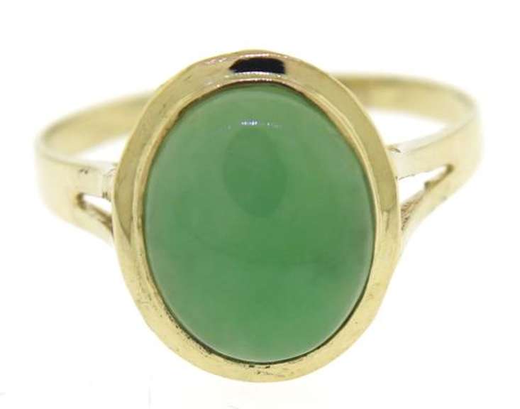 Pleasing Yellow Gold Green Jade Oval Bezel Set Ring