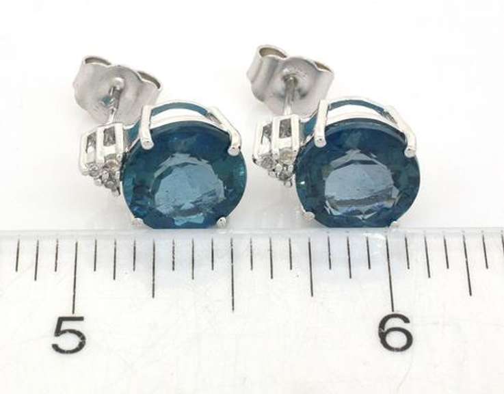 Beautiful 9.24CTW Blue Topaz Adorned with White Topaz Earrings