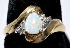 Elegant Pear-Cut Opal Ring in Yellow Gold