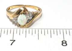 Elegant Pear-Cut Opal Ring in Yellow Gold