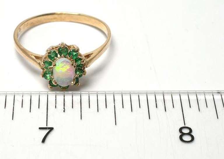 Beautiful Opal & Emerald Halo Ring in Yellow Gold