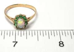 Beautiful Opal & Emerald Halo Ring in Yellow Gold